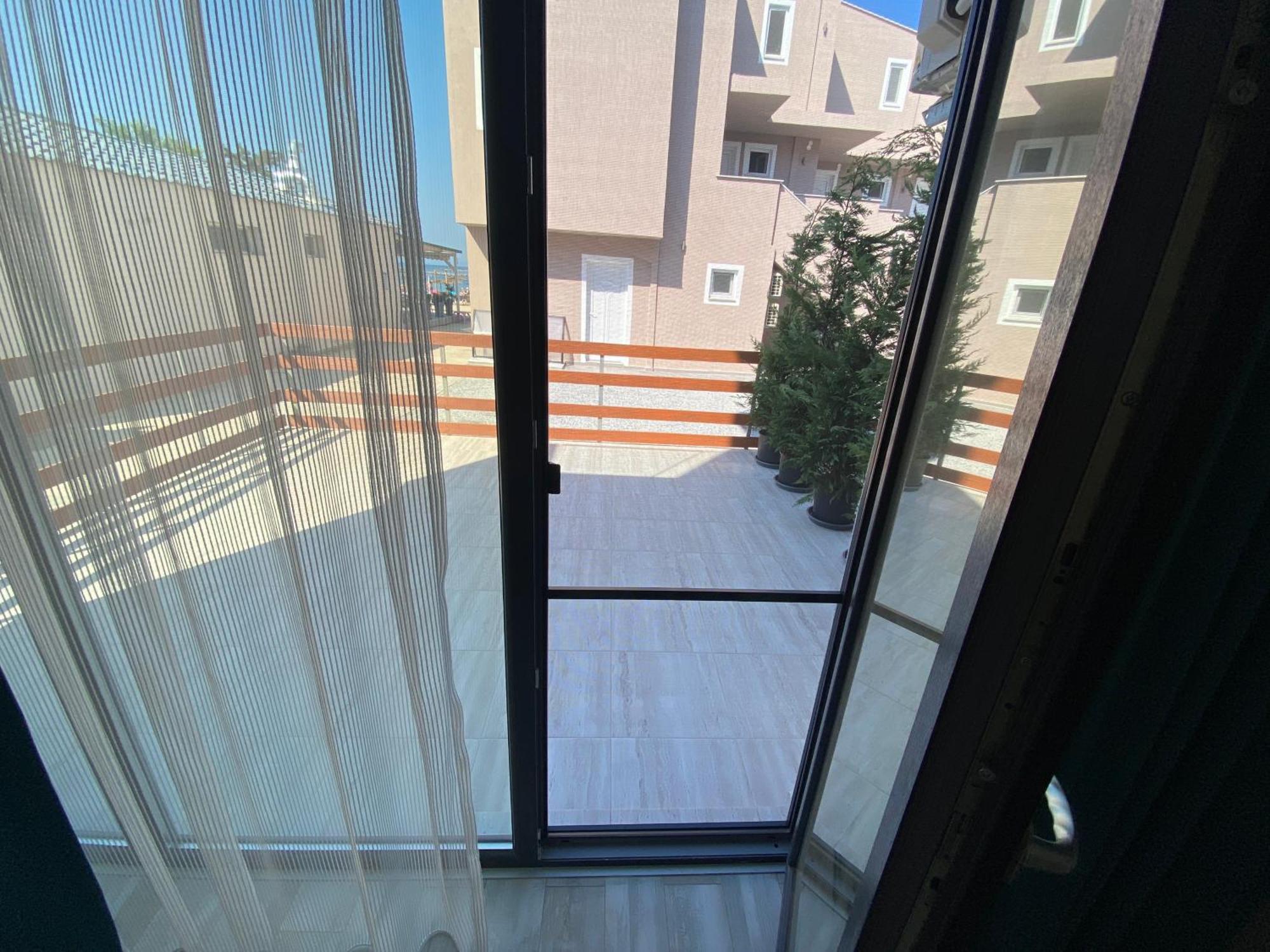 Opalium Beach Front Suites Potos Dış mekan fotoğraf