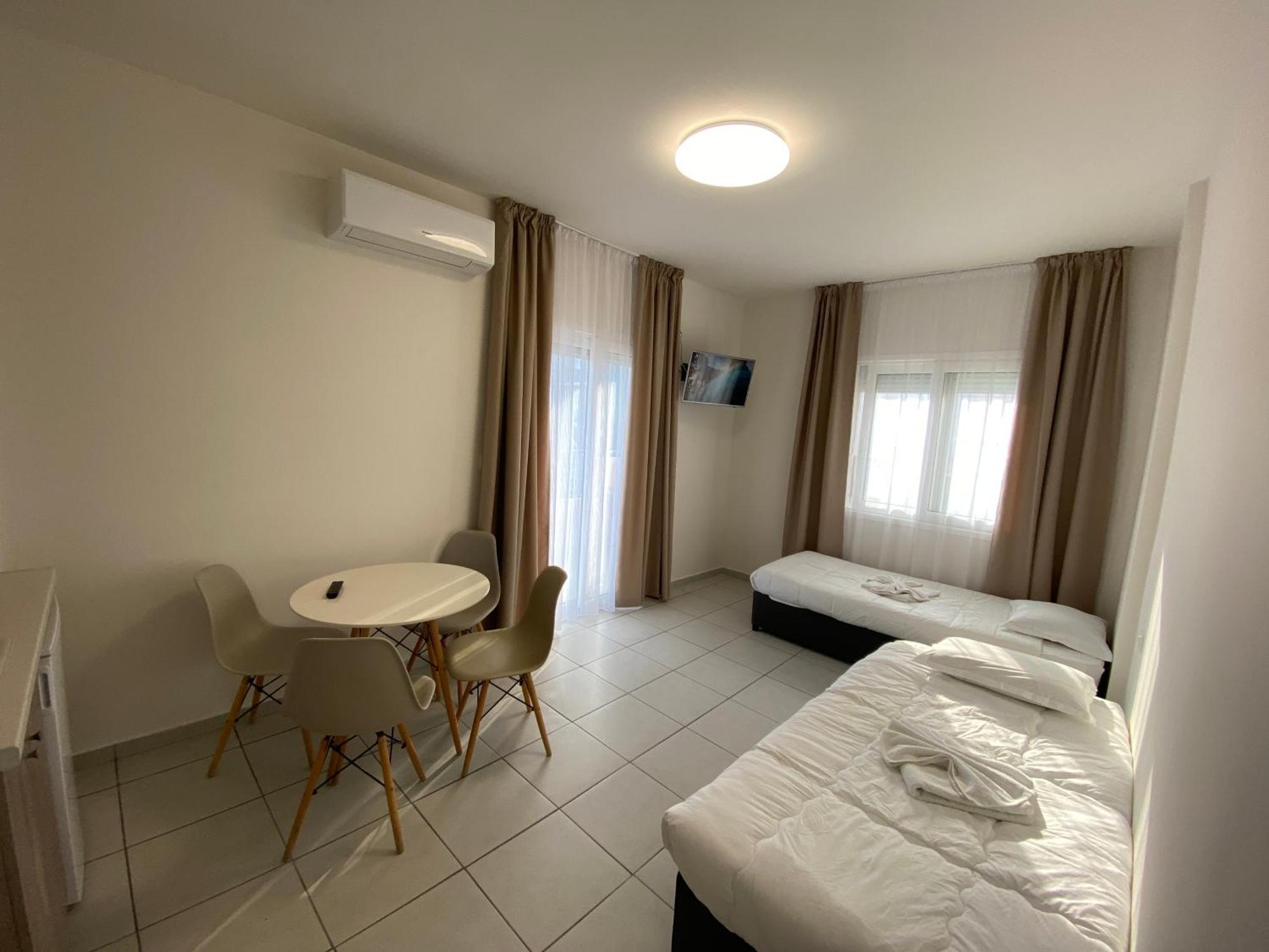 Opalium Beach Front Suites Potos Dış mekan fotoğraf