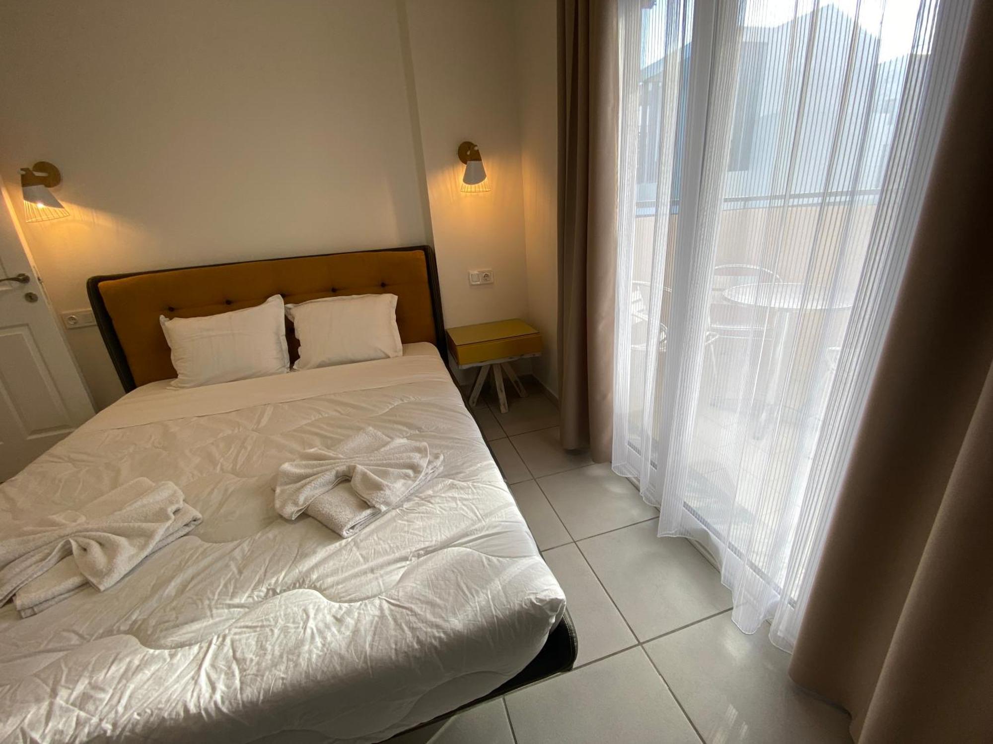 Opalium Beach Front Suites Potos Dış mekan fotoğraf